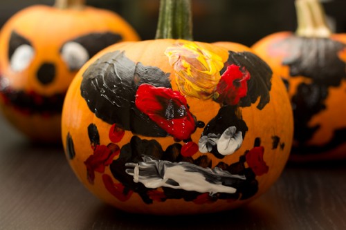 finger painting on a pumpking