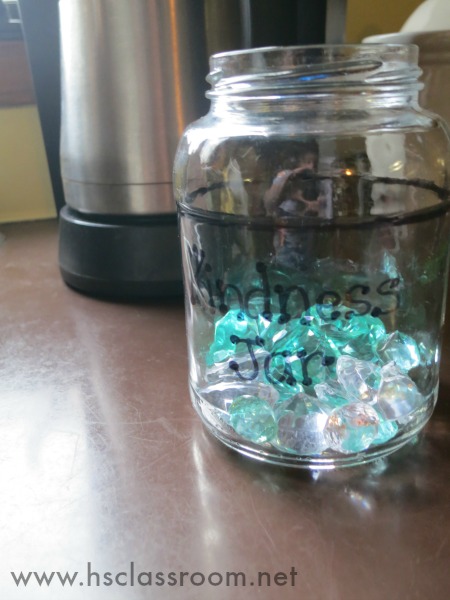 kindness jar on kitchen counter