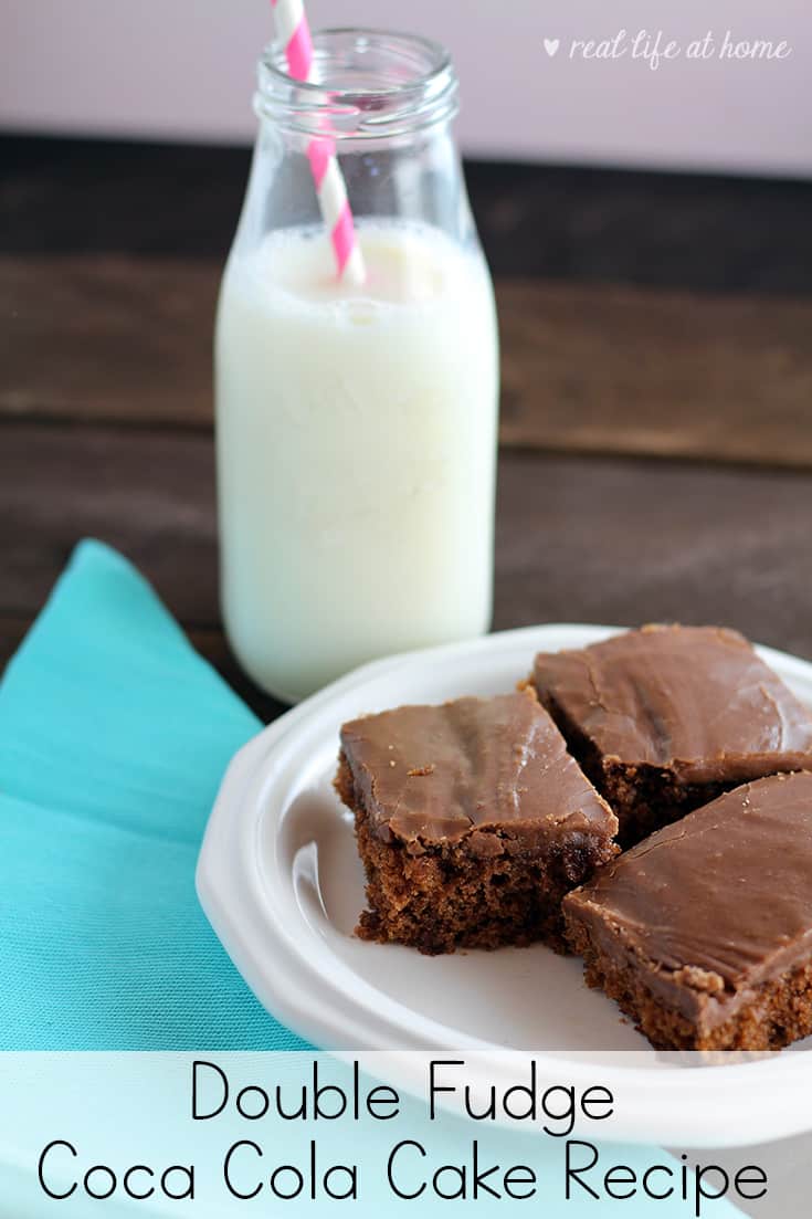 Looking for a rich and delicious chocolate cake to feed a crowd? This wonderful Double Fudge Coca Cola Cake just might be the perfect fit! This chocolate sheet cake is easy to make and is sure to be a hit for dessert! | Real Life at Home