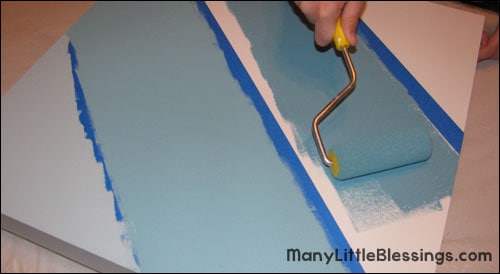 painting blue stripes on the table