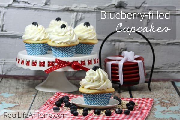 These delicious blueberry-filled cupcakes can be modified to other flavors as well, making them a versatile favorite! | RealLifeAtHome.com
