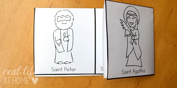 Folding the All Saints' Day Coloring Page to form an All Saints' Day mini book