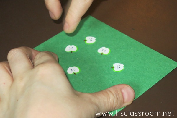 Placing Stickers on Number Cards | The Homeschool Classroom