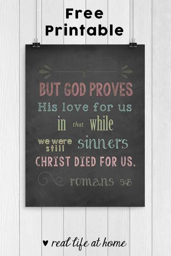 Free Printable: A chalkboard style Scripture art print download featuring the Bible verse from Romans 5:8 reminding us of God's great love for us. | Real Life at Home