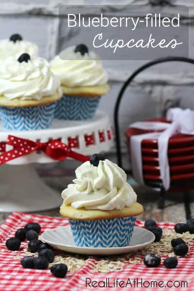 Perfect for summertime, or a dose of summer in the middle of winter, these blueberry-filled cupcakes can be modified to other flavors as well