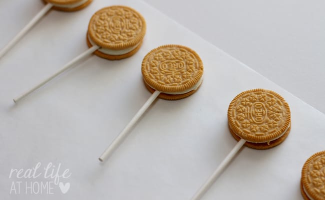 Oreos on sticks for Emoji Cookie Pops