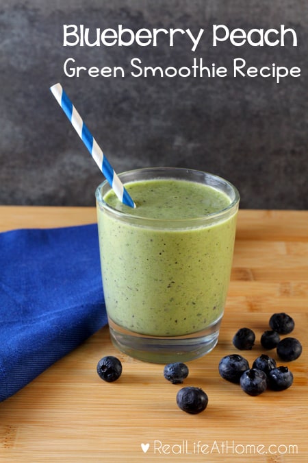 Easy to make and full of vitamins and nutrients, this Blueberry Peach Green Smoothie is delicious to drink and sure to please adults and children alike! | Real Life at Home