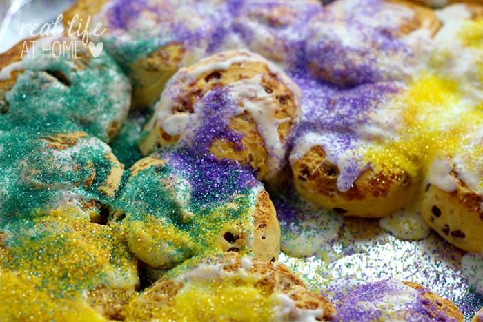 Need a Mardi Gras King Cake but short on time? This recipe, perfect for Fat Tuesday, is a super easy King Cake recipe to make in around 20 minutes. | Real Life at Home