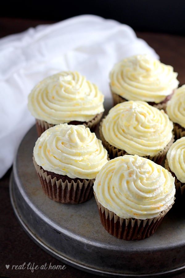 This light and fresh orange buttercream frosting recipe with orange zest added is sure to please a crowd. With my method for making the frosting airy and fluffy, this orange icing perfectly pairs with cakes and cupcakes and is easy to make! 