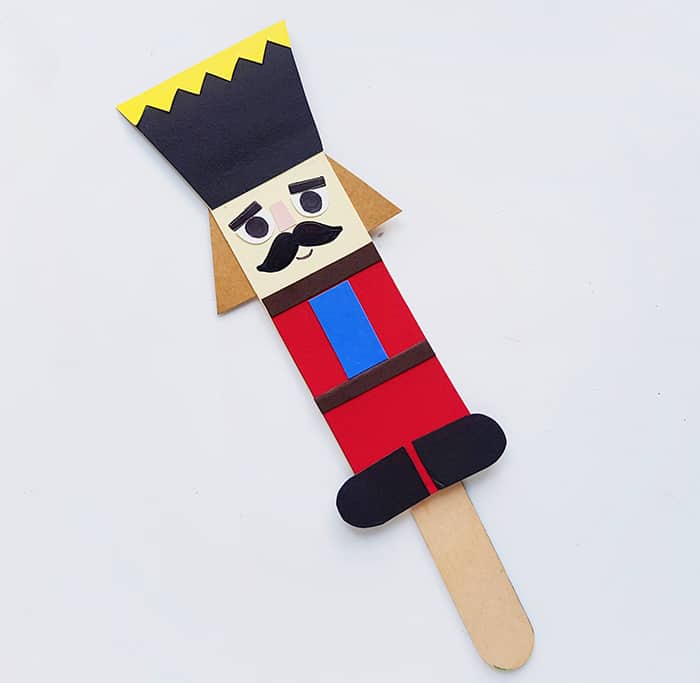 Step five of Nutcracker Stick Puppet Craft for Kids
